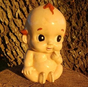 Kewpie baby doll bank